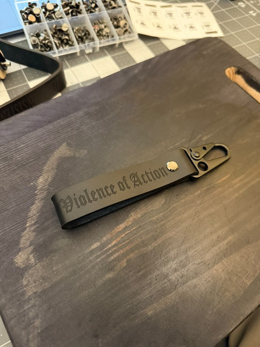 Violence of Action Leather Keychain